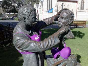 statue with purple bra